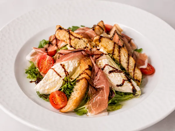 Burrata Salad special with toasted bruschetta